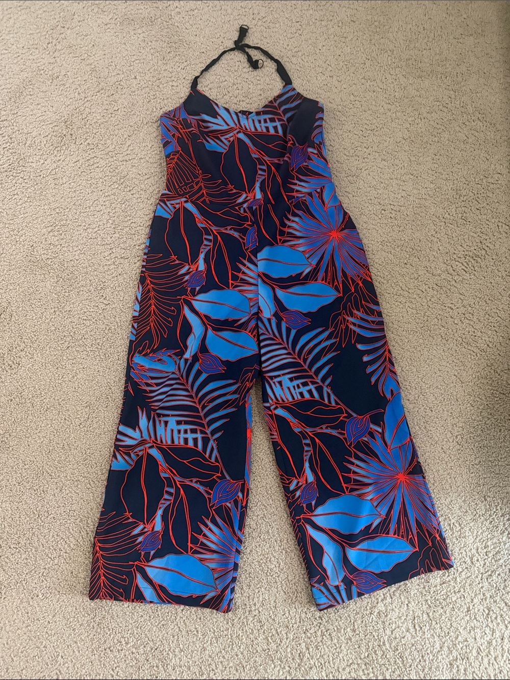 ECI Navy Halter Floral Print Jumpsuit with Bright Blue and Red Accents